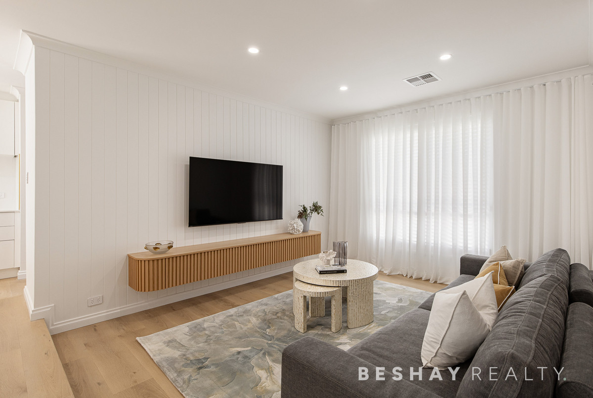 Renovated living room at 4 Gibla Street, Mandurah, marketed by Beshay Realty
